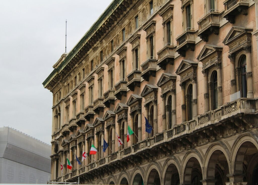 a building with many flags on the outside